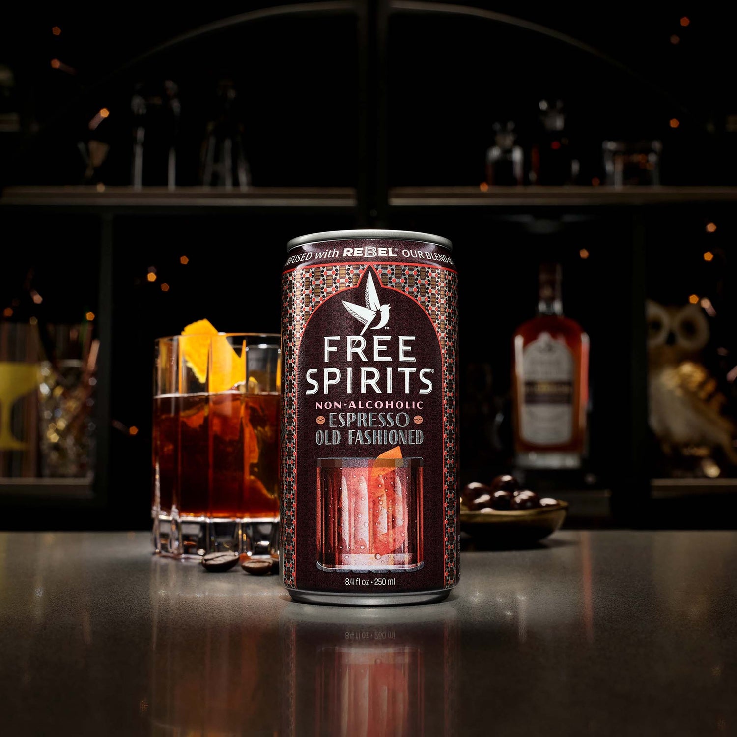 Espresso Old Fashioned Can with cocktail on bar top