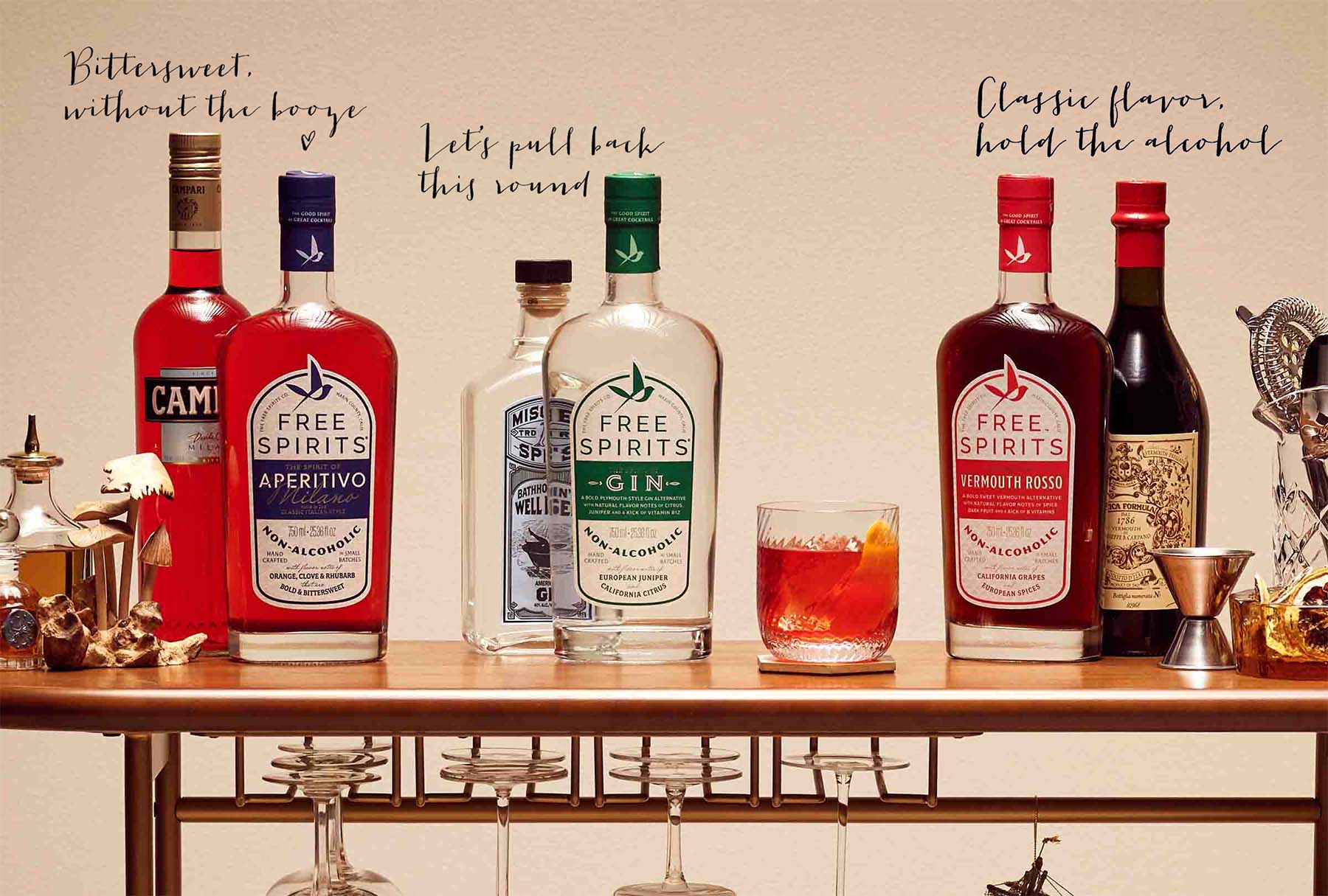 A bartop with Free Spirits in front of full-proof bottles