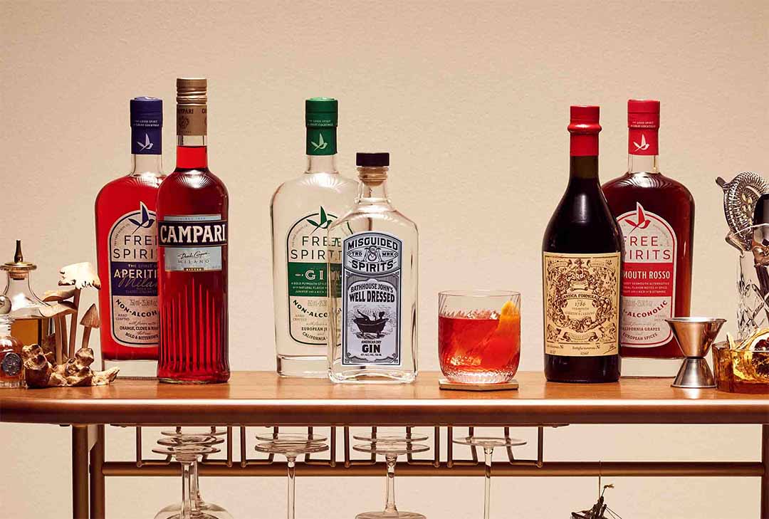 A bartop with full-proof bottles in front of Free Spirits