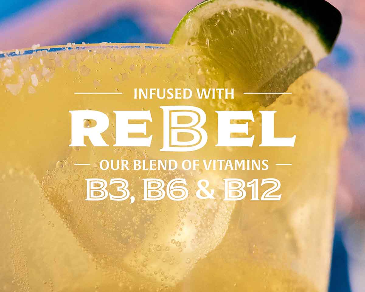 Non-alcoholic margarita with a lime wedge, featuring text about vitamins B3, B6, and B12.