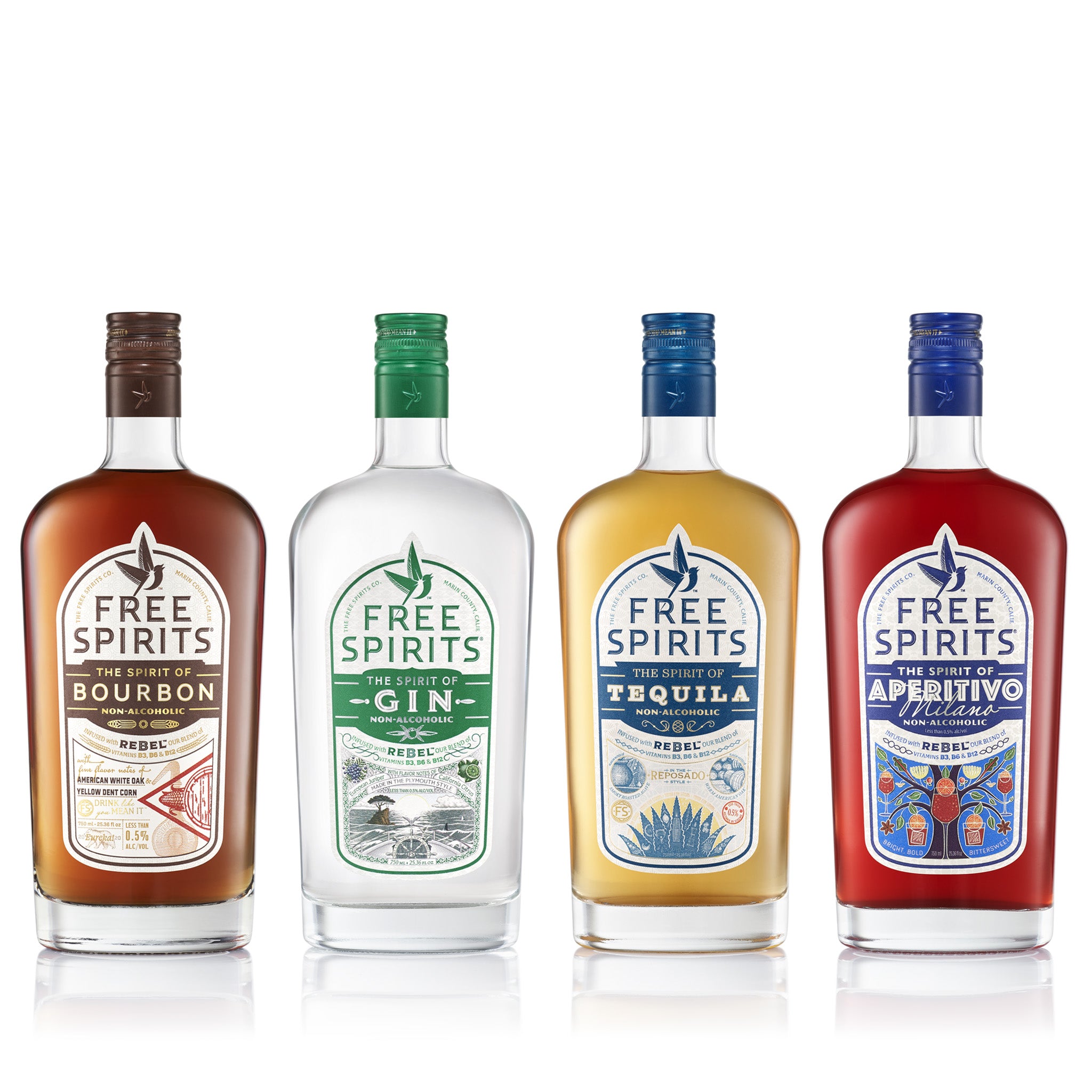 Four bottles of Free Spirits liquor with colorful labels on a white background