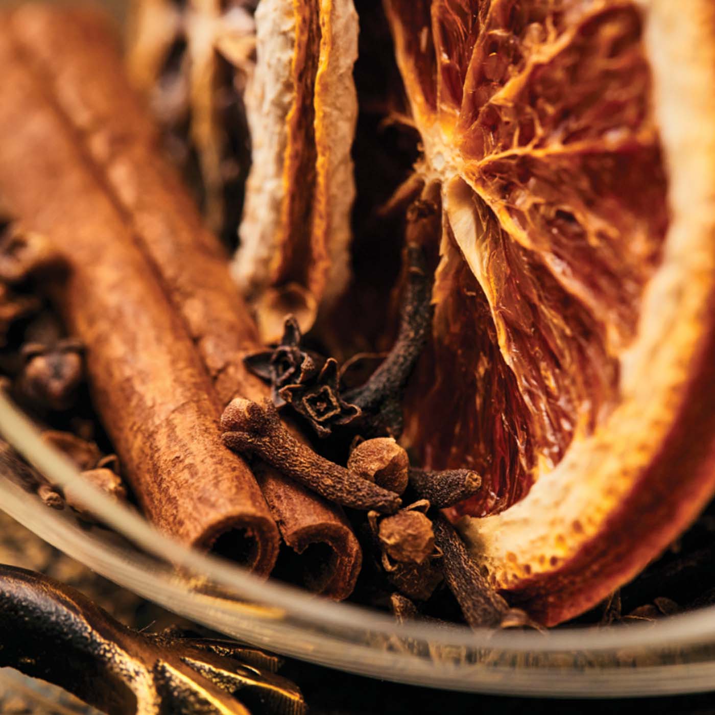 Clove, cinnamon, dried orange