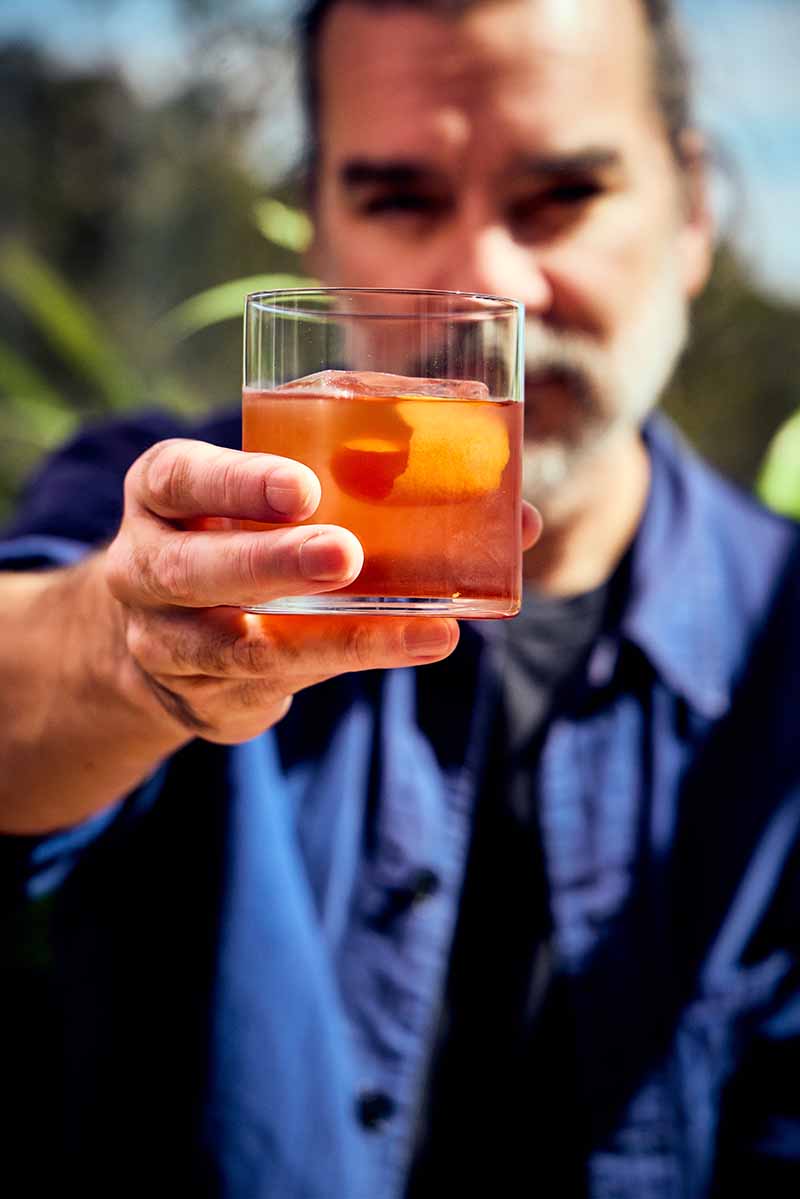 Jon holding a Negroni