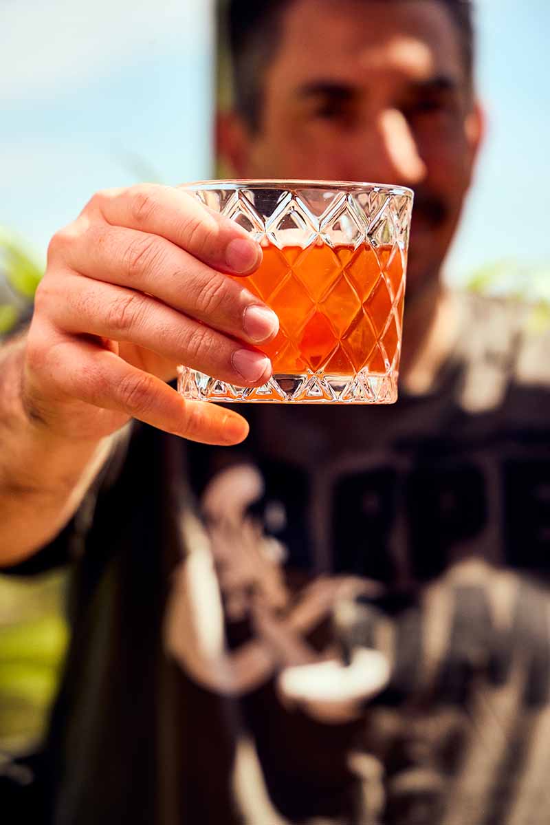 Shaun holding a Negroni