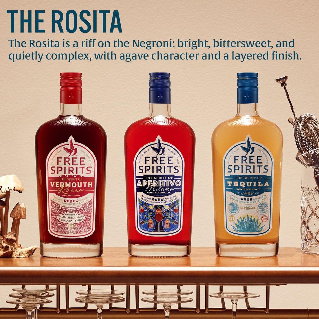 Three bottles of Free Spirits alcohol on a bar with text about The Rosita cocktail.