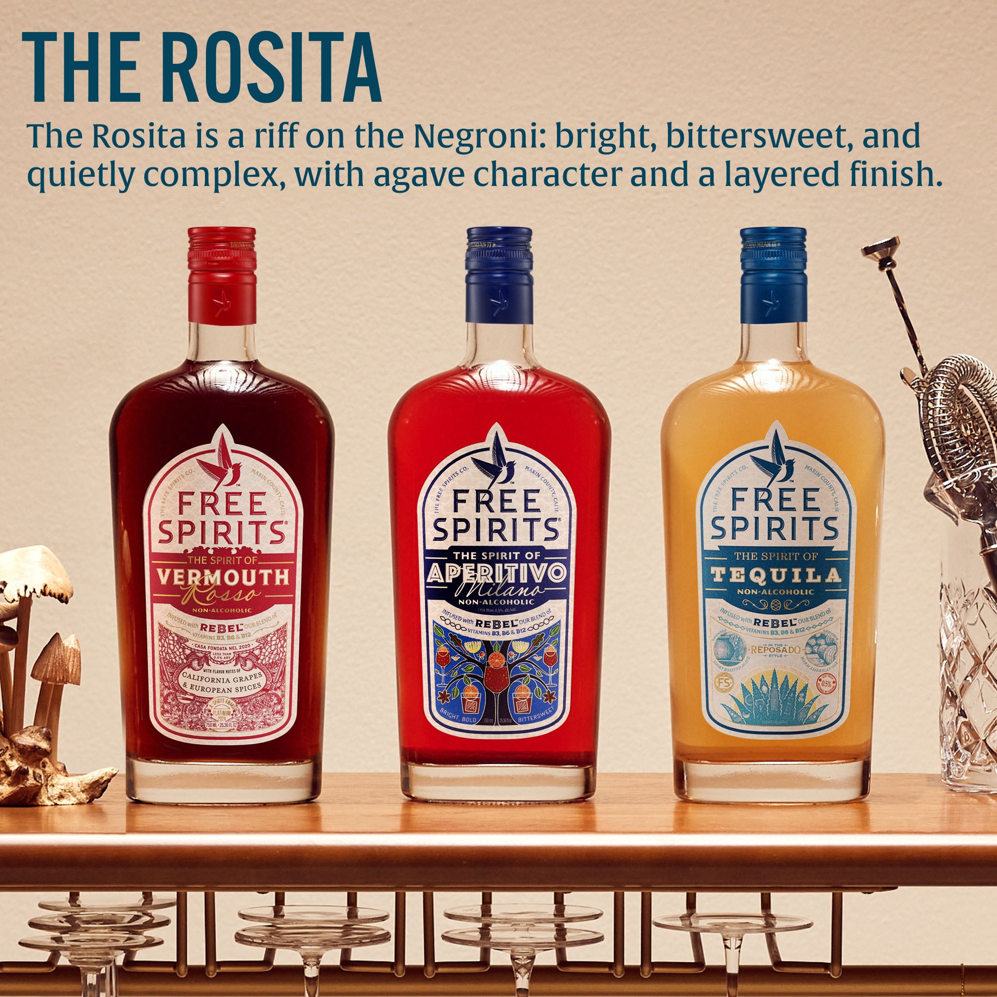 Three bottles of Free Spirits alcohol on a bar with text about The Rosita cocktail.