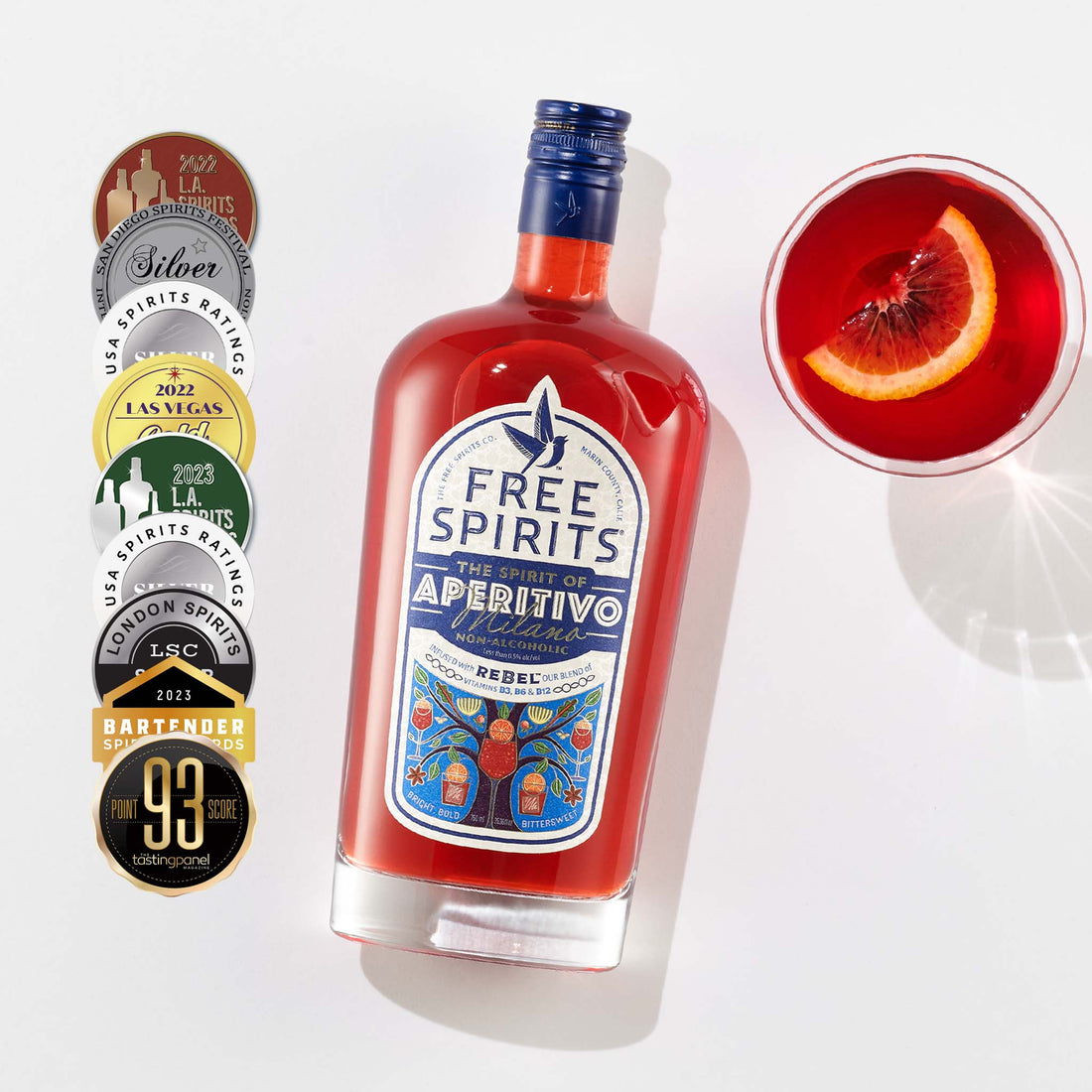 Bottle of Free Spirits Aperitivo with a cocktail and award badges on a white background