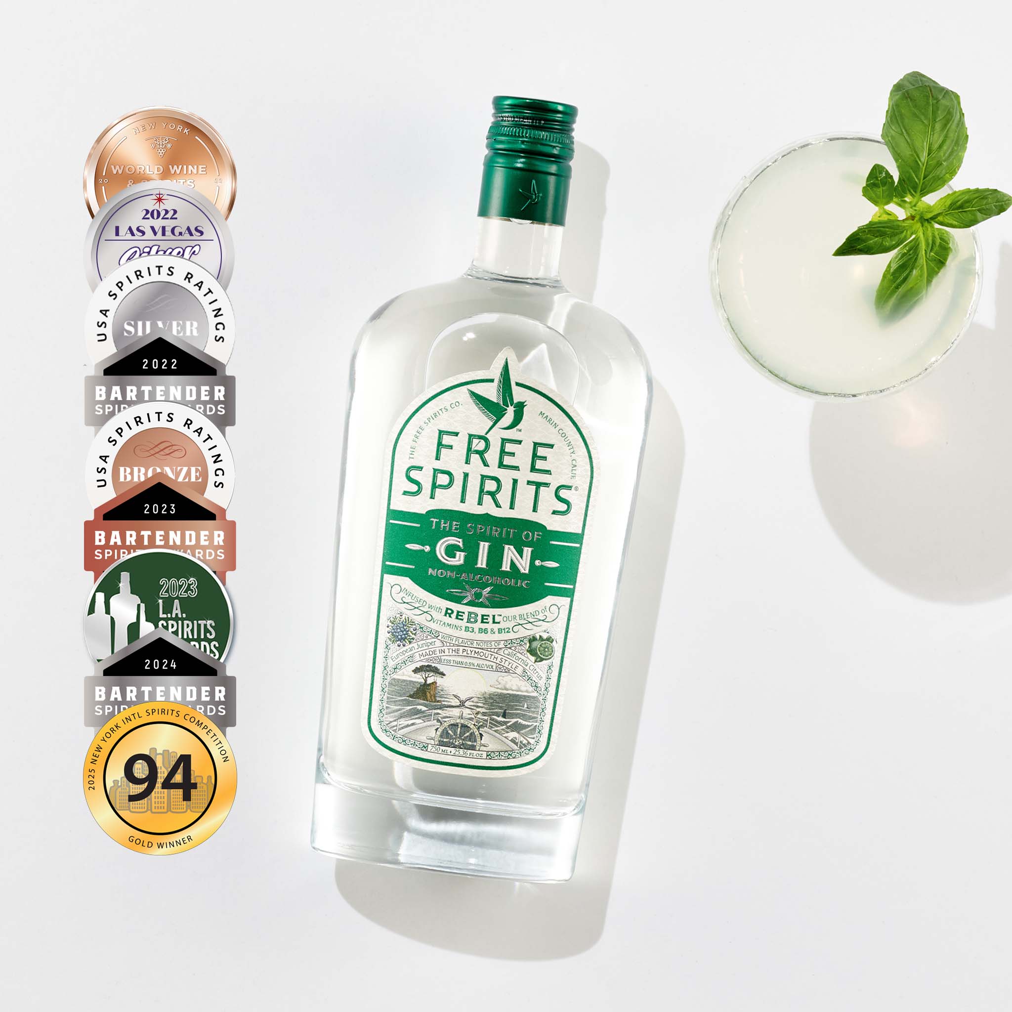 Bottle of Free Spirits gin with awards on a white background