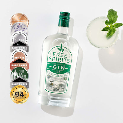 Bottle of Free Spirits gin with awards on a white background