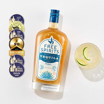 Free Spirits tequila bottle with a cocktail and award badges on a white background