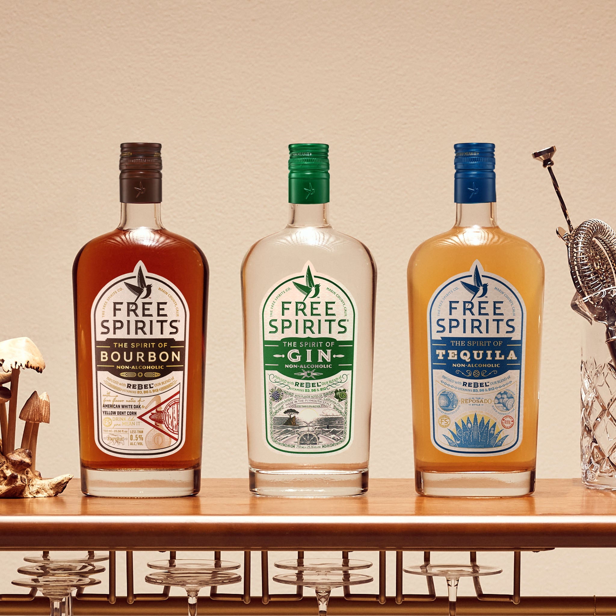 The Free Spirits Trifecta Bundle on a bar cart